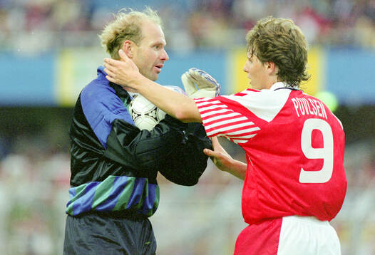Swedish goalkeeper Thomas Ravelli and Denmarks Flemming