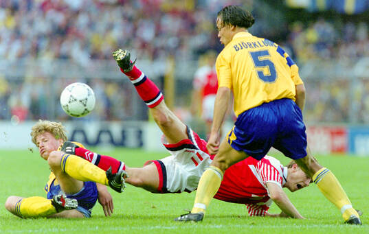 Swedens Stefan Schwarz (L) and Joachim Bjorklund against