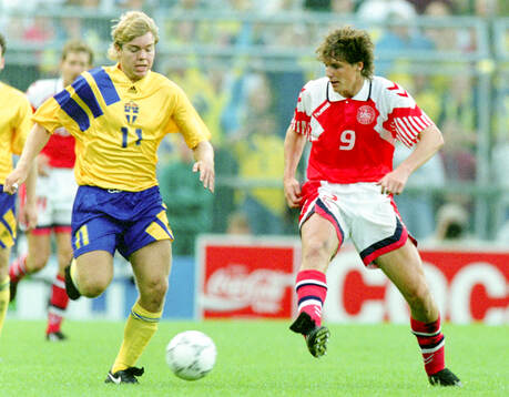 Swedens Tomas Brolin against Denmarks Flemming Povlsen