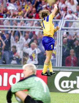 Swedens Tomas Brolin celebrates his goal, Denmarks