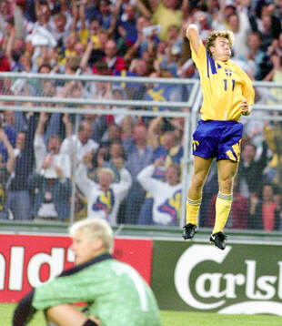 Swedens Tomas Brolin celebrates his goal, Denmarks