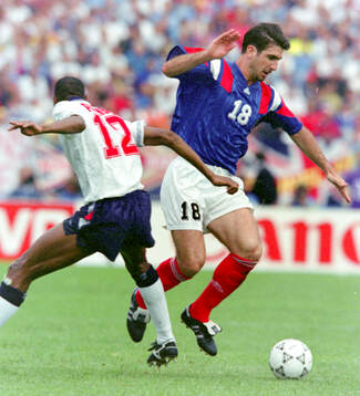 France’s Eric Cantona against Englands Carlton Palmer