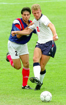 France’s Manuel Amoros against Englands Alan Shearer