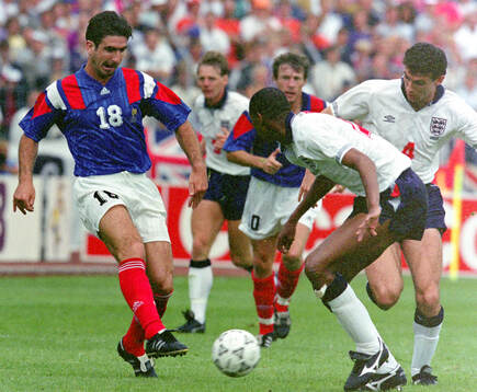 France’s Eric Cantona against Englands Carlton Palmer