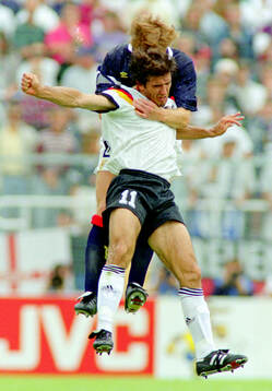 Germanys Karl-Heinz Riedle against Scotlands Richard Gough