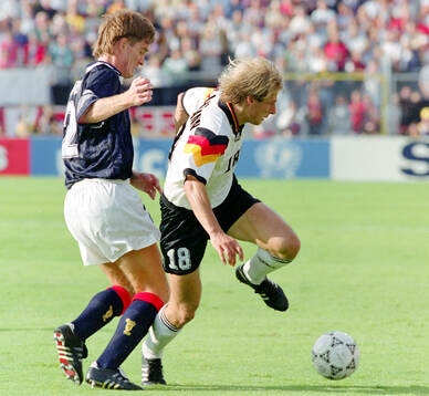 Germanys Jurgen Klinsmann against Scotlands Richard Gough