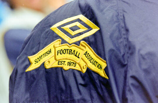A scottish player with a logo of The Scottish Football