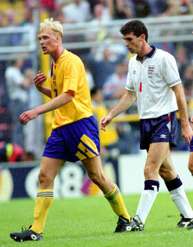 Swedens Klas Ingesson and Englands Martin Keown