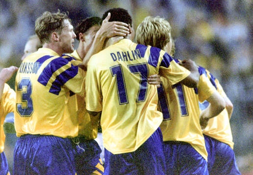 Swedens winning goalscorer Tomas Brolin (11) celebrates