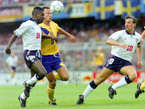 Englands Tony Daley (L) and Gary Lineker against Swedens