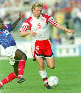 Denmarks Henrik Andersen against France‚Äôs Basile Boli