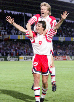 Denmarks Flemming Povlsen (L) and Henrik Andersen celebrates