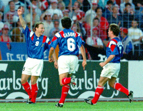 Jean-Pierre Papin of France celebrates his 1-0 goal