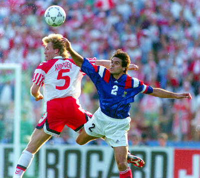 Denmarks Henrik Andersen (L) against Manuel Amoros of