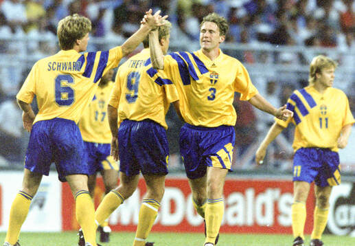 Swedens Jan Eriksson (3) celebrates his equalizing goal to