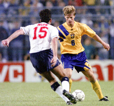 Swedens Stefan Schwarz against Englands Neil Webb