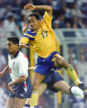 Swedens Martin Dahlin against Englands Des Walker