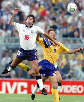 Englands Neil Webb against Swedens Stefan Schwarz in aerial