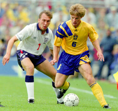 Swedens Stefan Schwarz against Englands David Platt