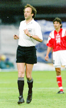 Referee Kurt Rothlisberger of Switzerland