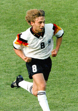 Thomas Hassler of Germany celebrates his goal for 1-0