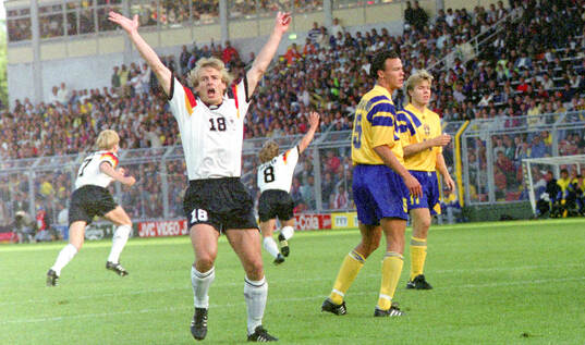 Thomas Hassler (8) of Germany celebrates
