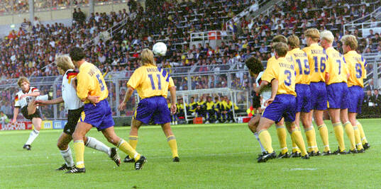 Thomas Hassler of Germany scores the goal for 1-0