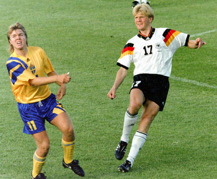 Stefan Effenberg of Germany against Swedens Tomas Brolin