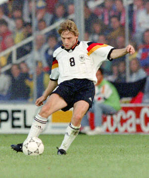 Thomas Hassler of Germany scores the goal for 1-0