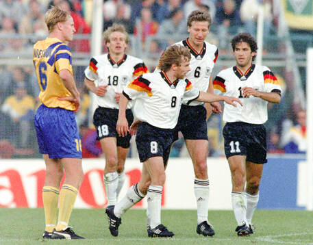 Thomas Hassler (8) of Germany celebrates