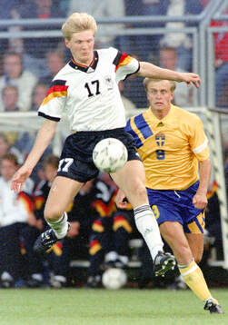 Stefan Effenberg of Germany against Jonas Thern of Sweden
