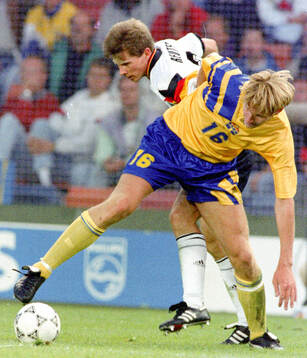 Kennet Andersson of Sweden against Stefan Reuter of Germany