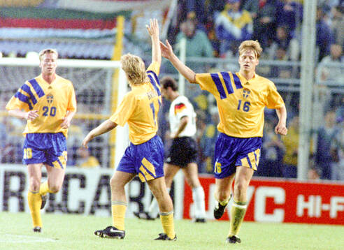 Kennet Andersson (16) of Sweden celebrates his goal with