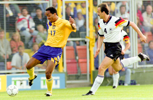 Swedens Martin Dahlin against Germanys Jurgen Kohler