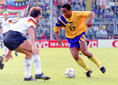 Swedens Martin Dahlin against Germanys Jurgen Kohler