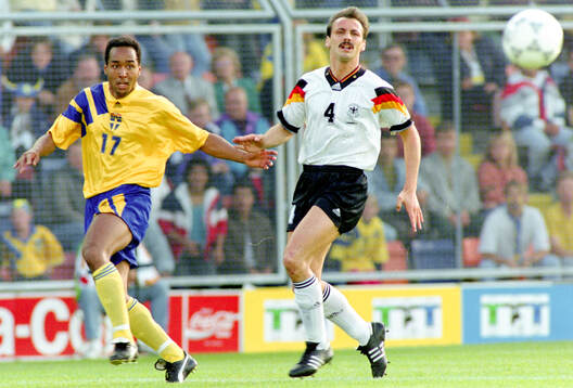 Swedens Martin Dahlin against Germanys Jurgen Kohler