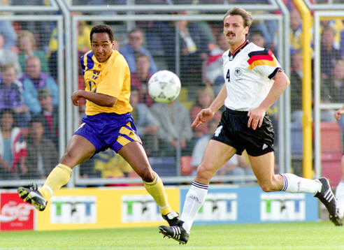 Swedens Martin Dahlin against Germanys Jurgen Kohler