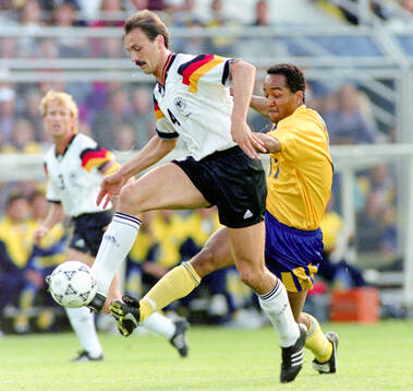 Germanys Jurgen Kohler against Swedens Martin Dahlin