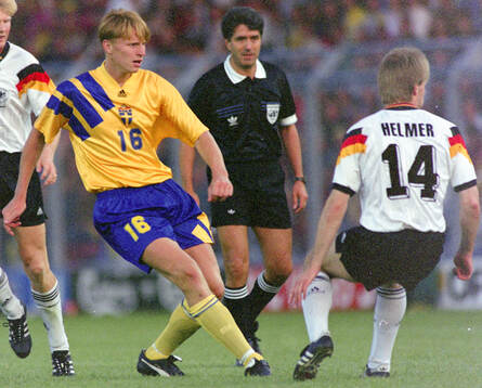 Swedens Kennet Andersson against Germanys Thomas Helmer