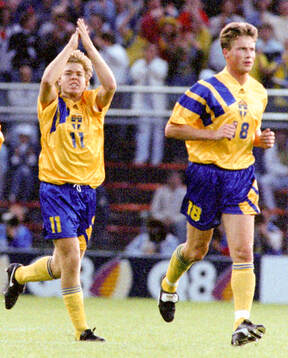 Swedens Tomas Brolin celebrates his penalty goal. Right