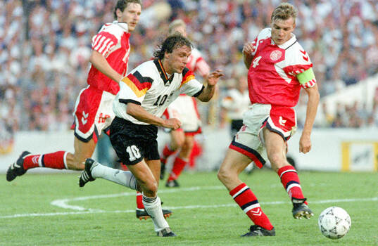 Germanys Thomas Doll (L) against Denmarks Lars Olsen