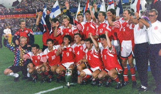 The Danish team celebrates