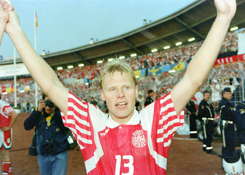 Denmarks Henrik Larsen celebrates