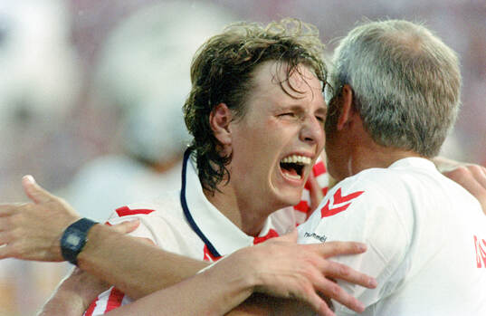 Denmarks Flemming Povlsen celebrates with manager Richard
