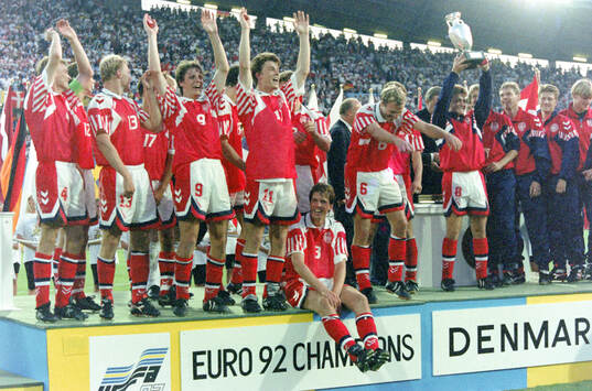 The Danish team celebrates