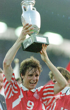 Denmarks Flemming Povlsen celebrates with the trophy