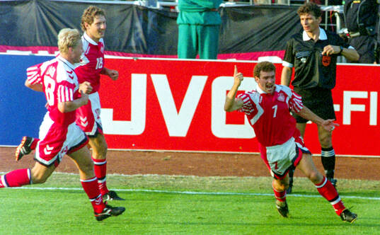 Denmarks John Jensen celebrates