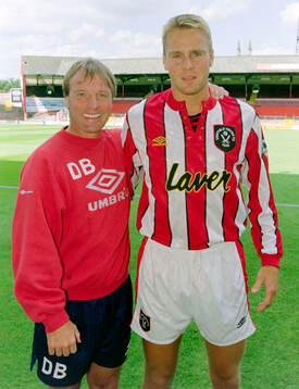 Jonas Wirmola of Sheffield United (R) with manager Dave