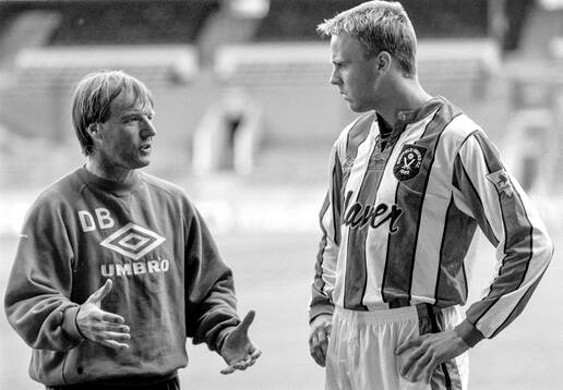 Jonas Wirmola of Sheffield United (R) with manager Dave