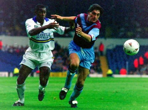 Chris Fairclough of Leeds against Tony Gale of West Ham